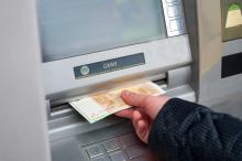 Cash machine. Photo: Tomas Urbelionis / Shutterstock
